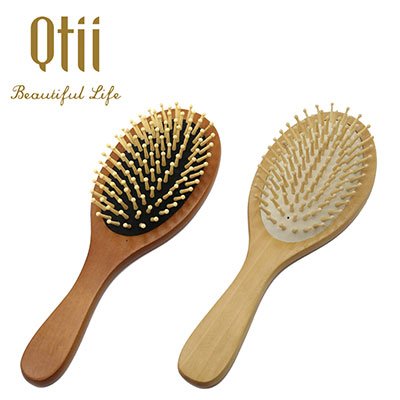 Oval wooden hair brush